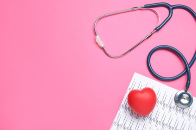 Stethoscope, cardiogram, red decorative heart and space for text on pink background, flat lay. Cardiology concept