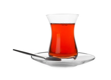 Photo of Tasty Turkish tea in glass isolated on white
