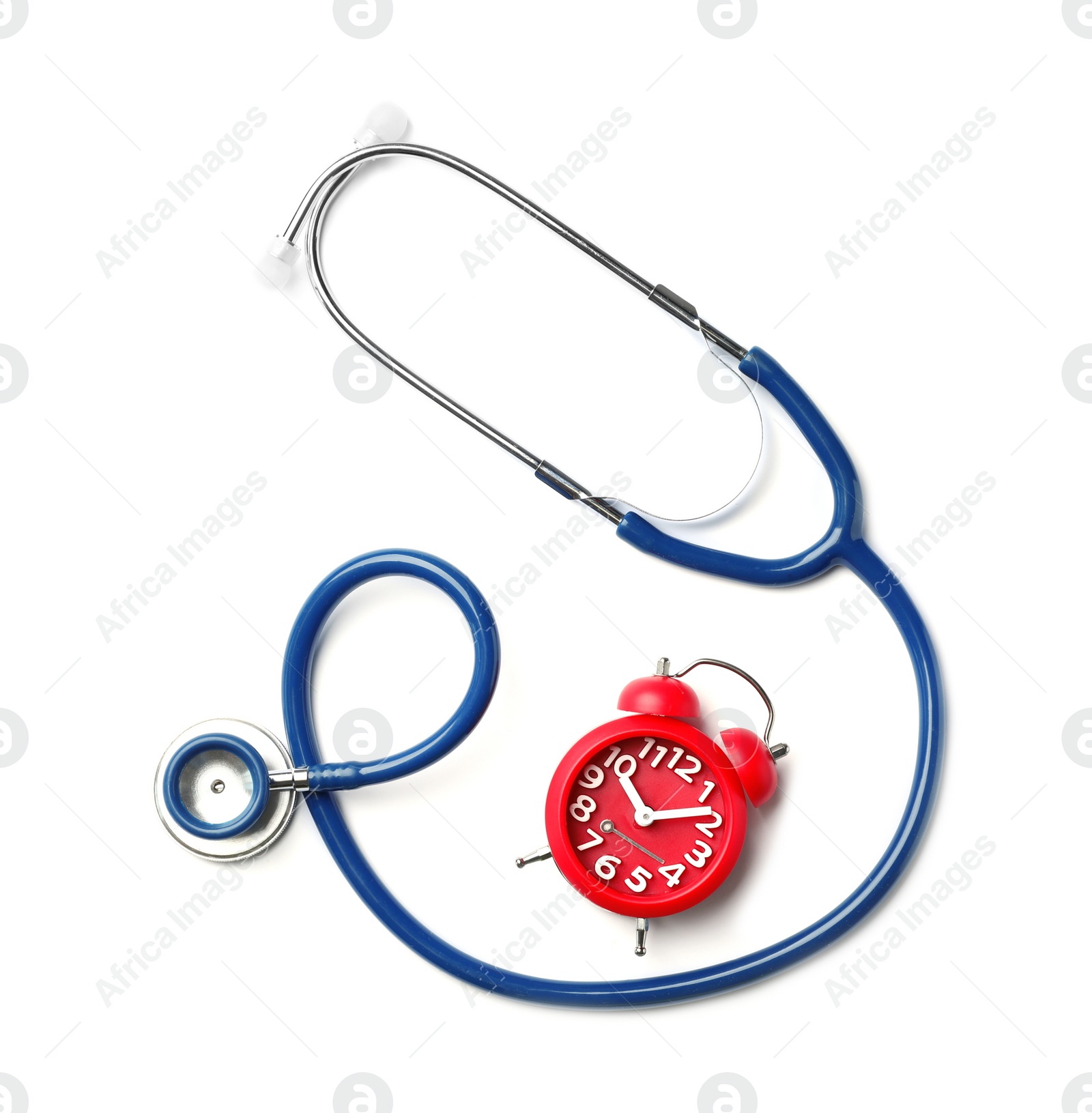 Photo of Stethoscope and red alarm clock for checking pulse on white background, top view
