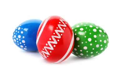 Photo of Decorated Easter eggs on white background. Festive tradition