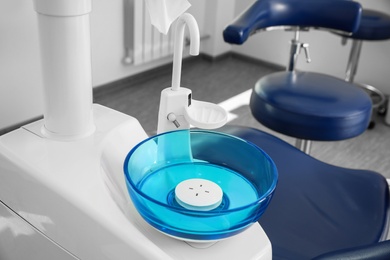 Photo of Clean spit sink in modern dentist's office