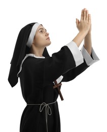 Photo of Nun with clasped hands praying to God on white background