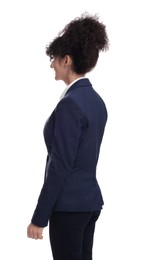 Young businesswoman in suit standing on white background