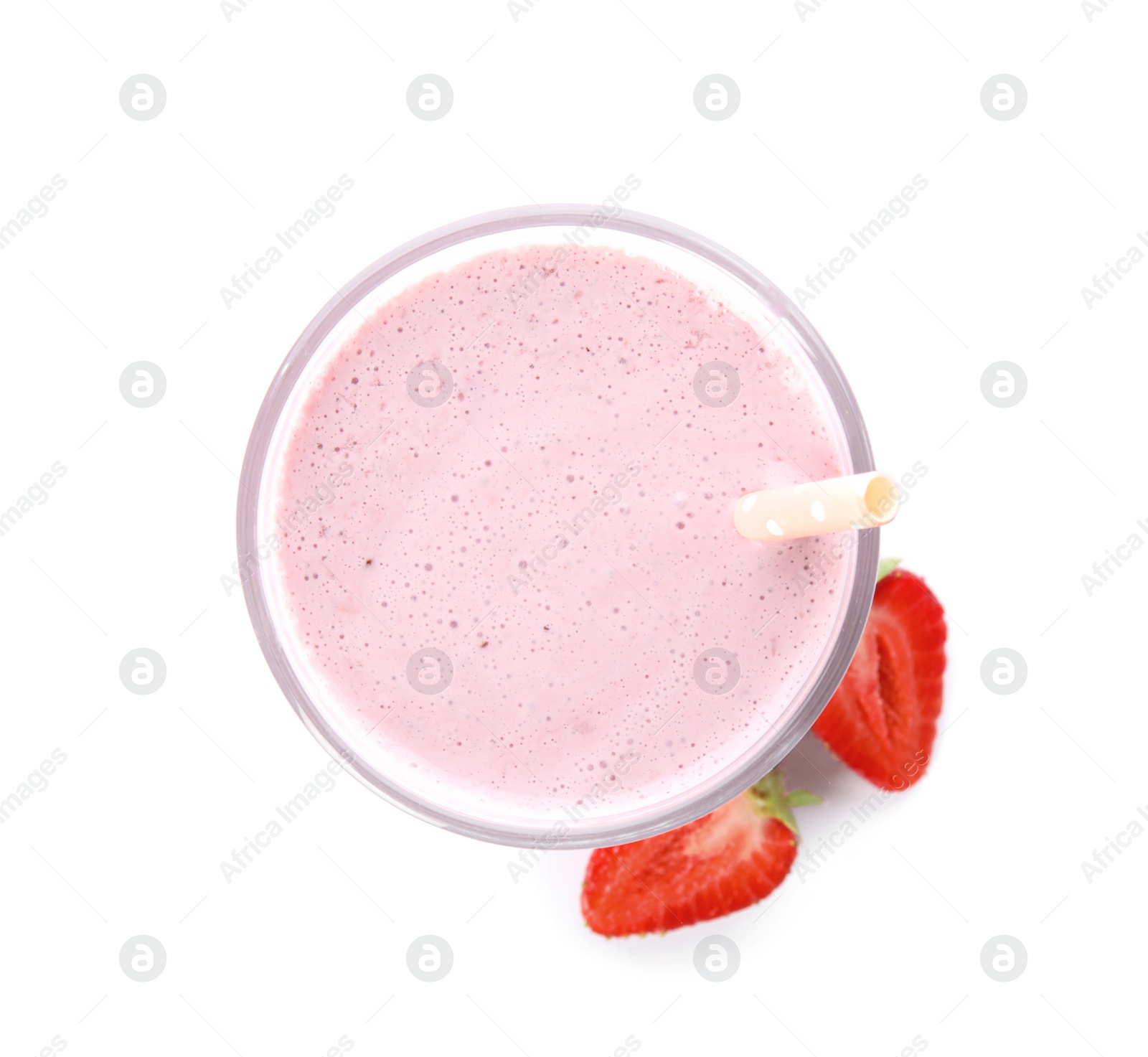 Photo of Tasty strawberry milk shake and fresh berries isolated on white, top view