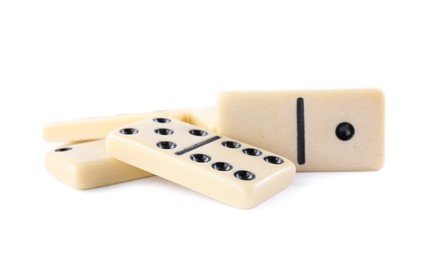 Photo of Many classic domino tiles on white background