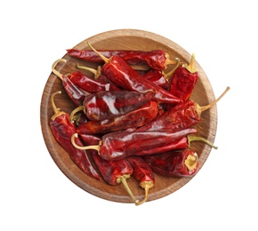 Photo of Plate with dry chili pepper on white background