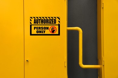 Image of Sign with text Authorized Person Only on gas distribution cabinet