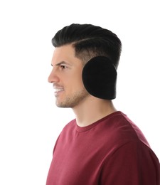 Photo of Man wearing stylish earmuffs on white background