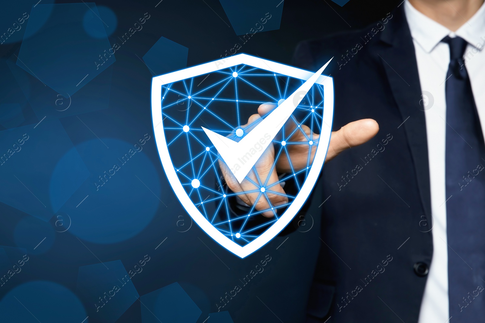 Image of Anti-fraud security system. Man pointing at illustration of checkmark in shield on dark background, closeup. Space for text