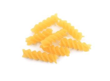Raw fusilli pasta isolated on white, top view