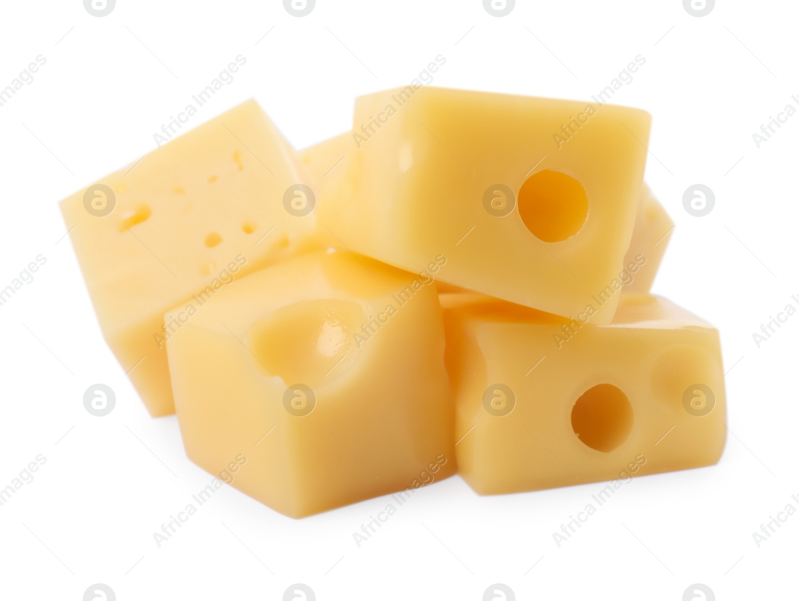 Photo of Cubes of delicious cheese isolated on white