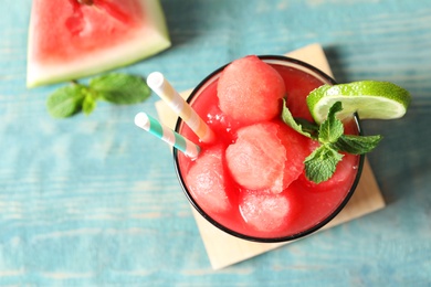 Photo of Summer watermelon drink with mint and lime on table, top view