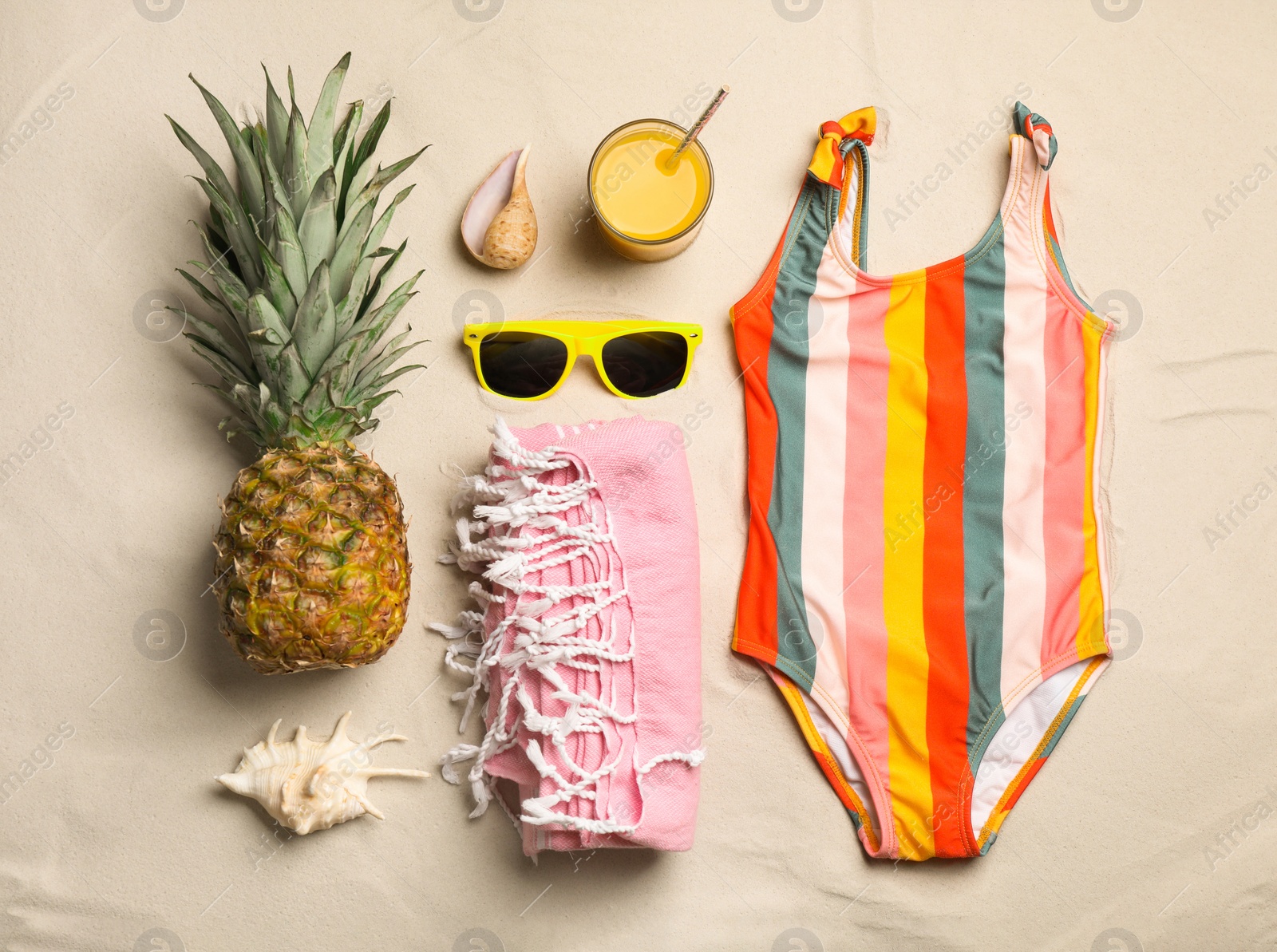 Photo of Flat lay composition with beach objects on sand