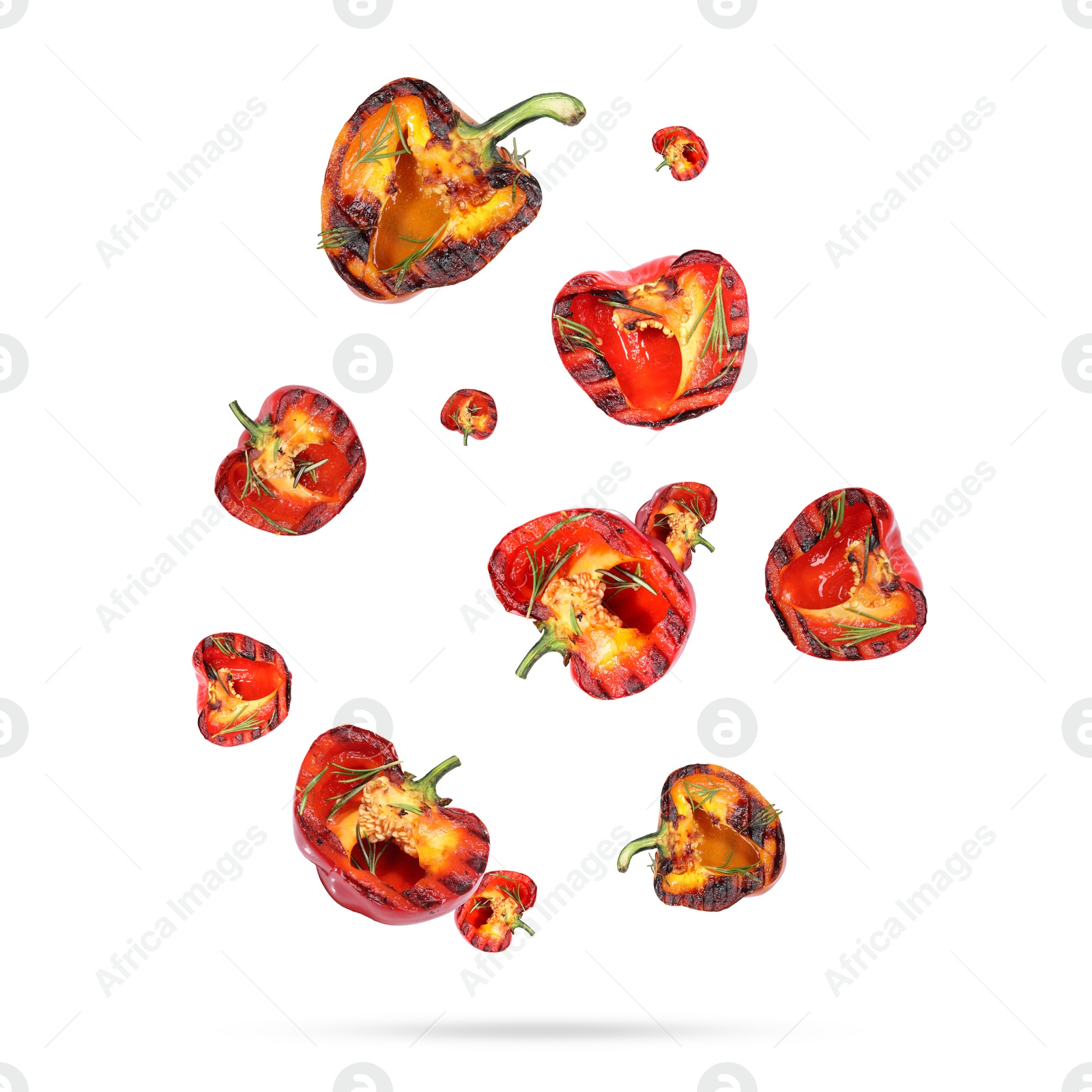 Image of Slices of grilled bell peppers in air on white background