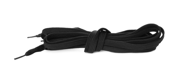 Photo of Black shoe laces tied in knot isolated on white