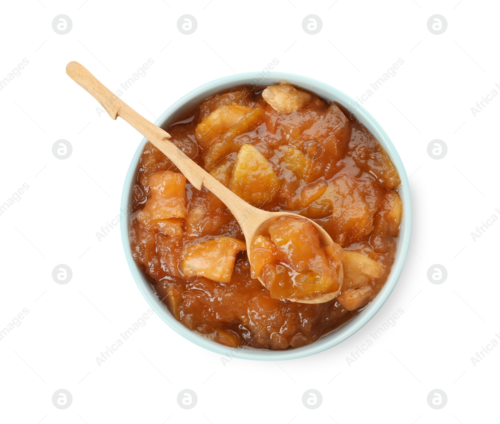 Photo of Tasty apple jam and spoon in bowl isolated on white, top view