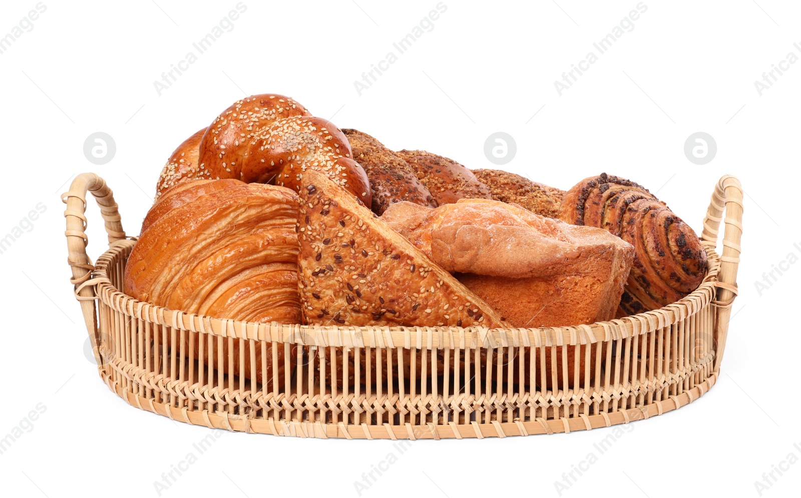 Photo of Different tasty pastries in wicker basket isolated on white