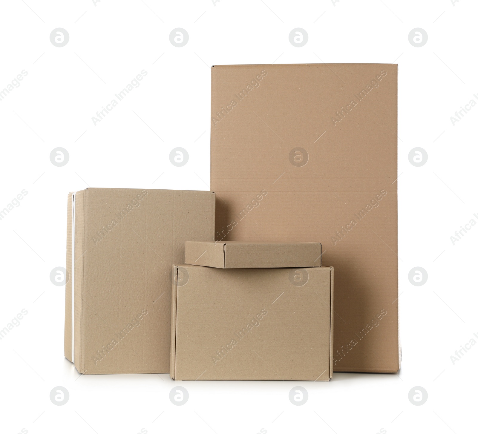 Photo of Pile of cardboard boxes on white background