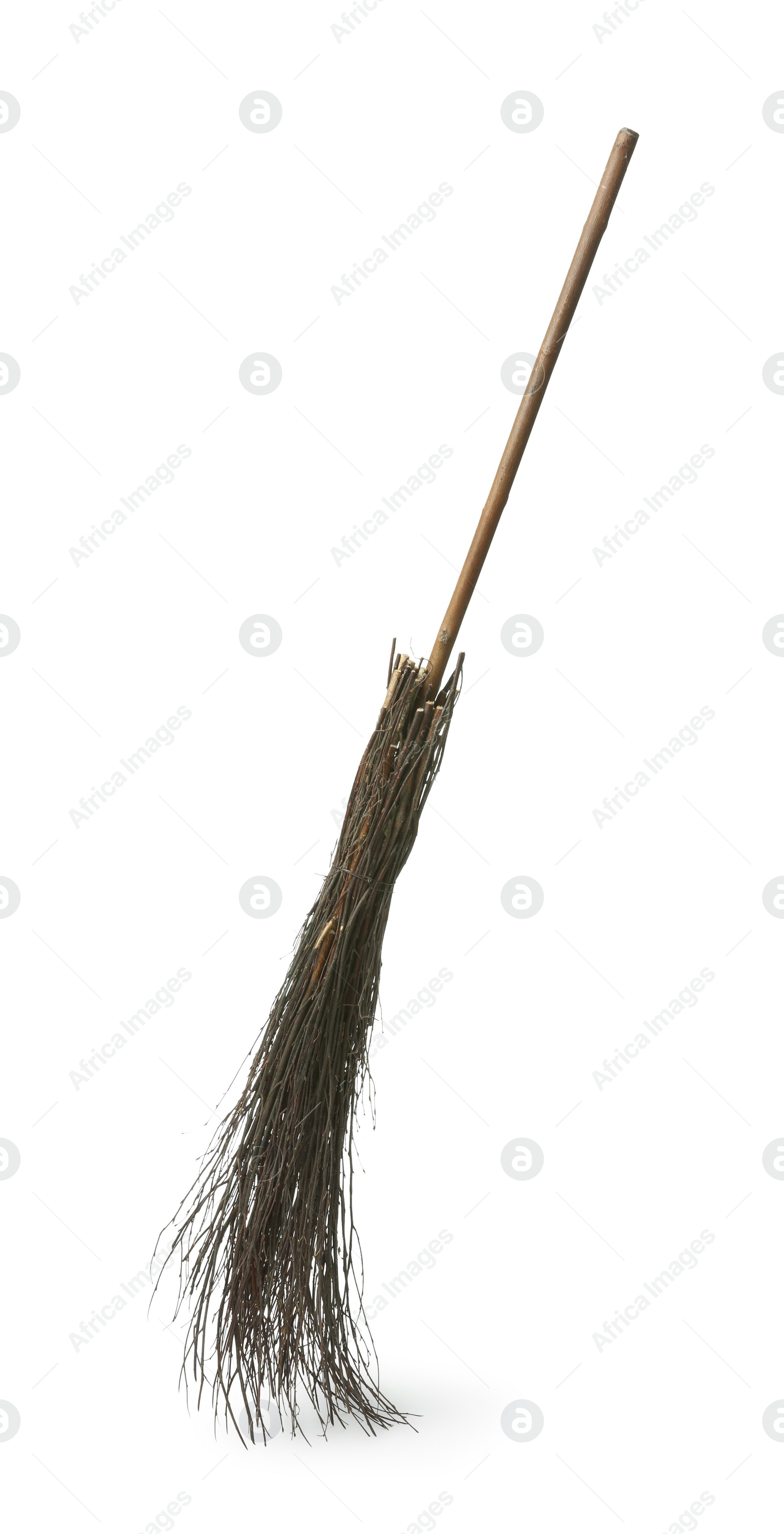 Photo of Old broom with wooden handle isolated on white