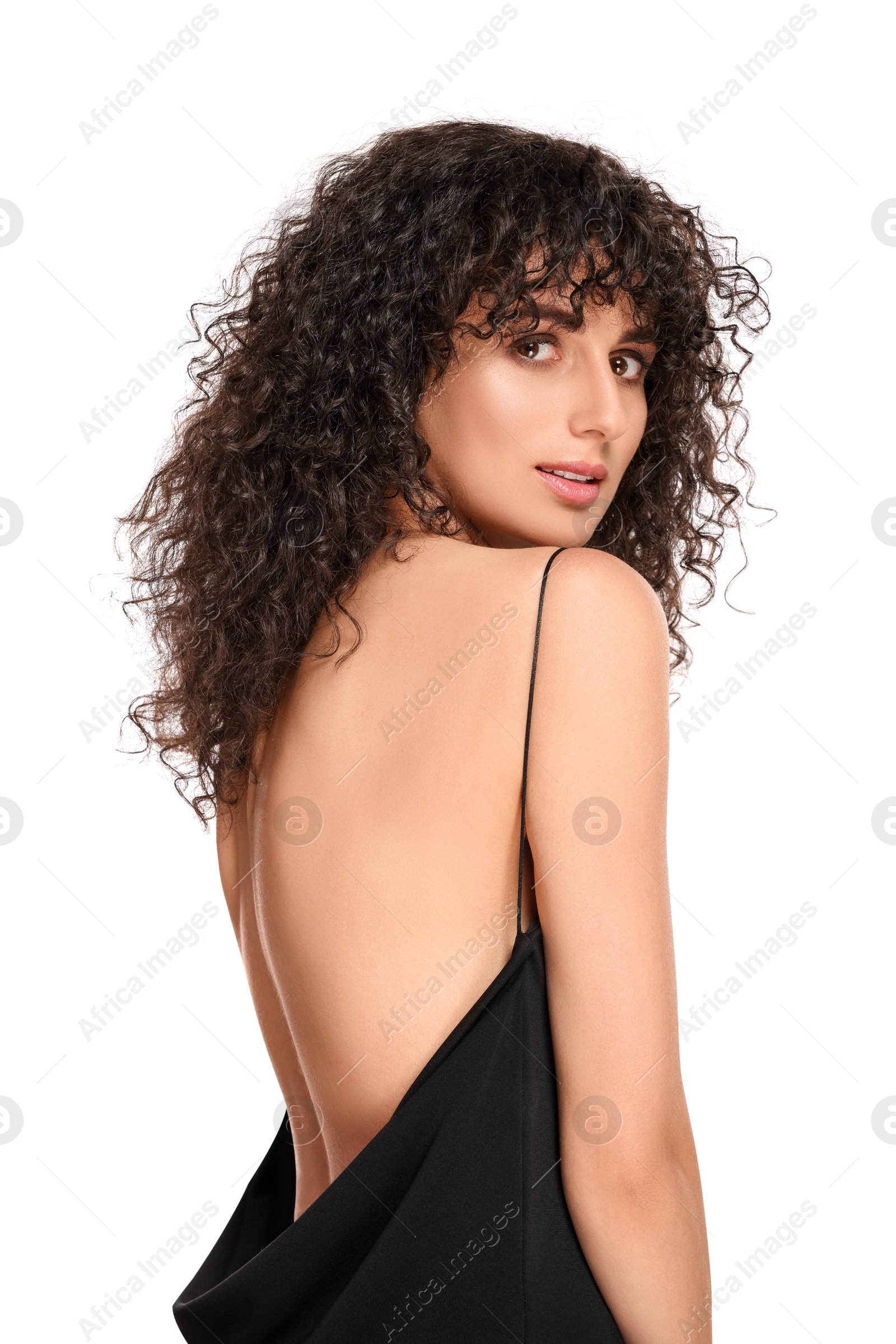 Photo of Beautiful young woman with long curly hair on white background