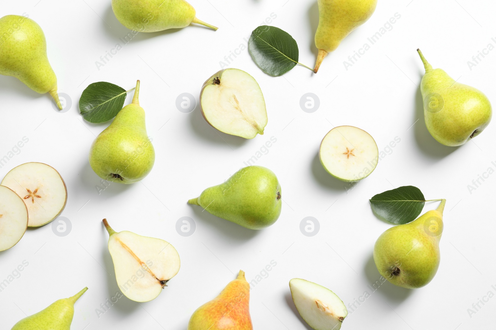 Photo of Ripe juicy pears on white background, top view