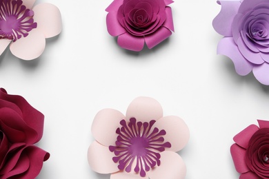 Photo of Different beautiful flowers made of paper on white background, top view