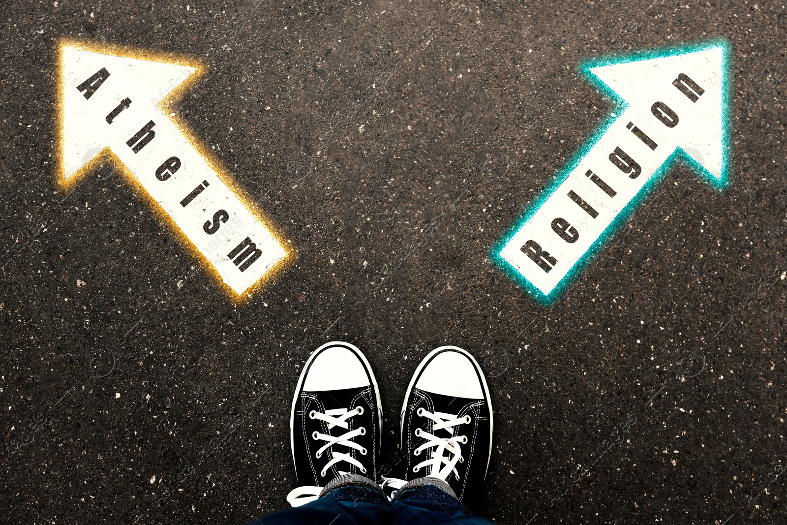 Image of Choice between atheism and religion. Woman standing on road near arrows marking, top view