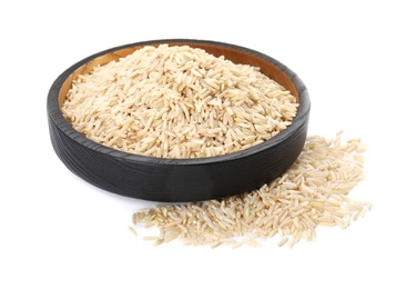 Photo of Plate with raw unpolished rice on white background