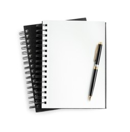 Photo of Two notebooks and pen isolated on white, top view