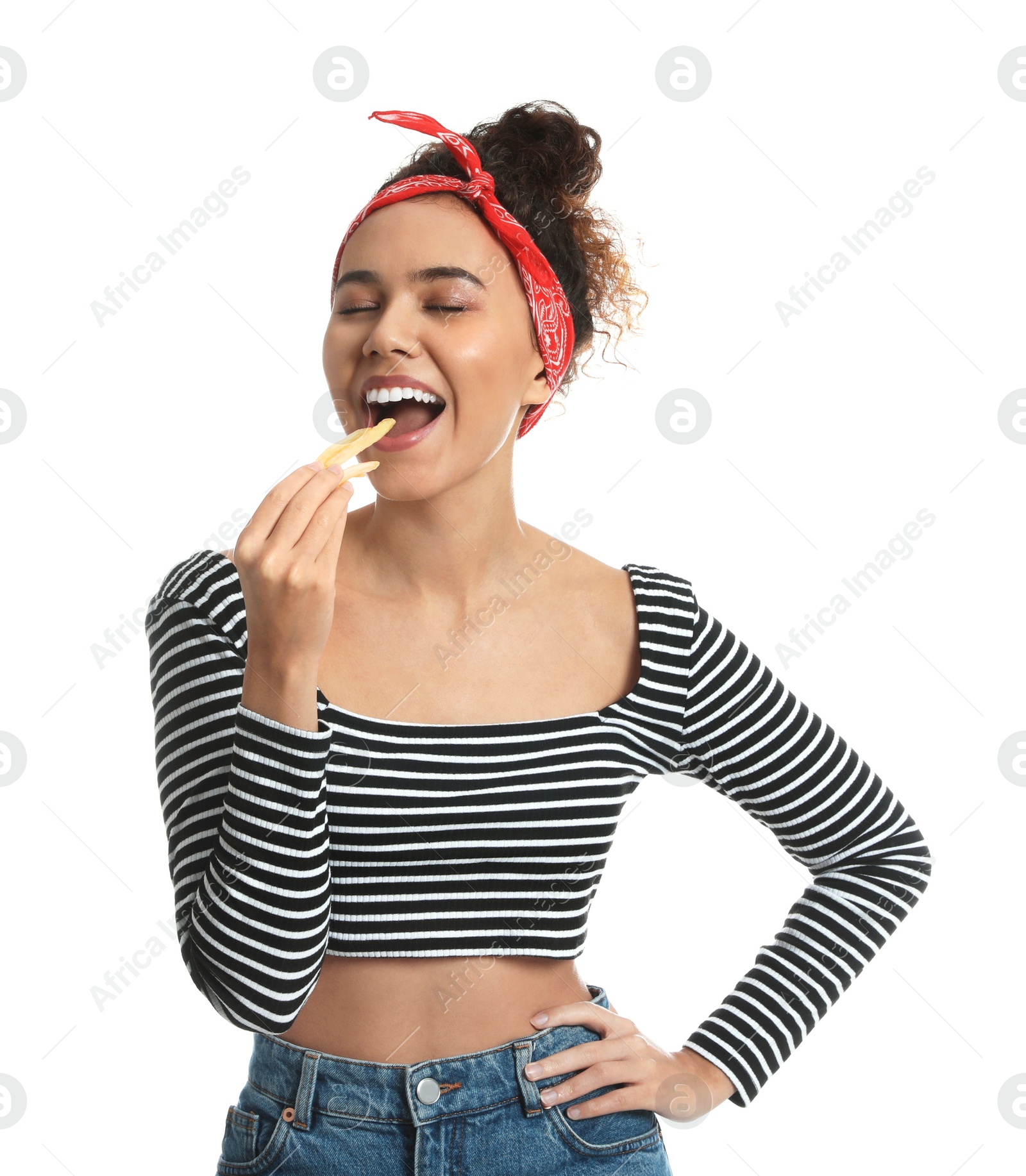 Photo of African American woman eating French fries on white background