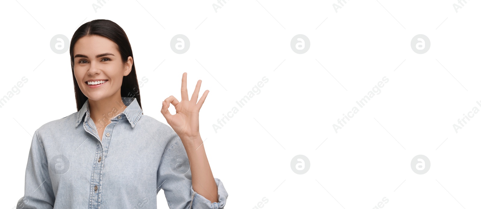 Image of Woman with clean teeth smiling and showing ok gesture on white background, space for text. Banner design