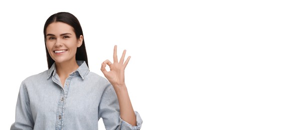 Image of Woman with clean teeth smiling and showing ok gesture on white background, space for text. Banner design