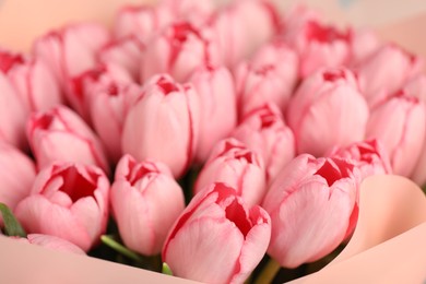 Bouquet of beautiful pink tulips as background, closeup