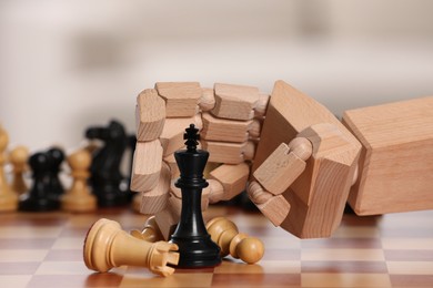 Robot playing chess, closeup. Wooden hand representing artificial intelligence