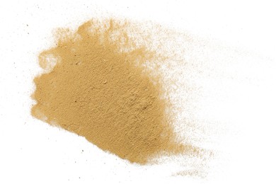 Photo of Pile of brown dust scattered on white background, top view