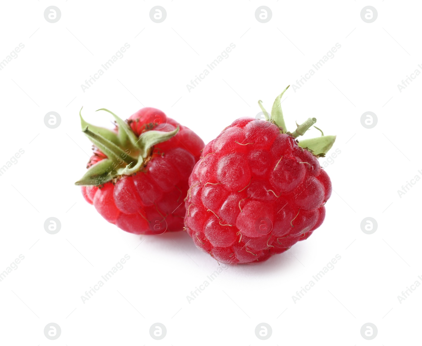 Photo of Delicious fresh ripe raspberries isolated on white