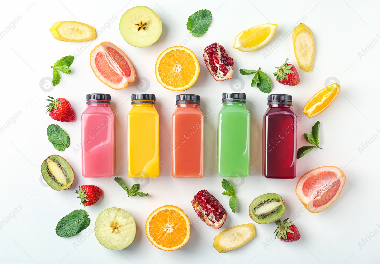 Photo of Flat lay composition with tasty juices and ingredients on light background