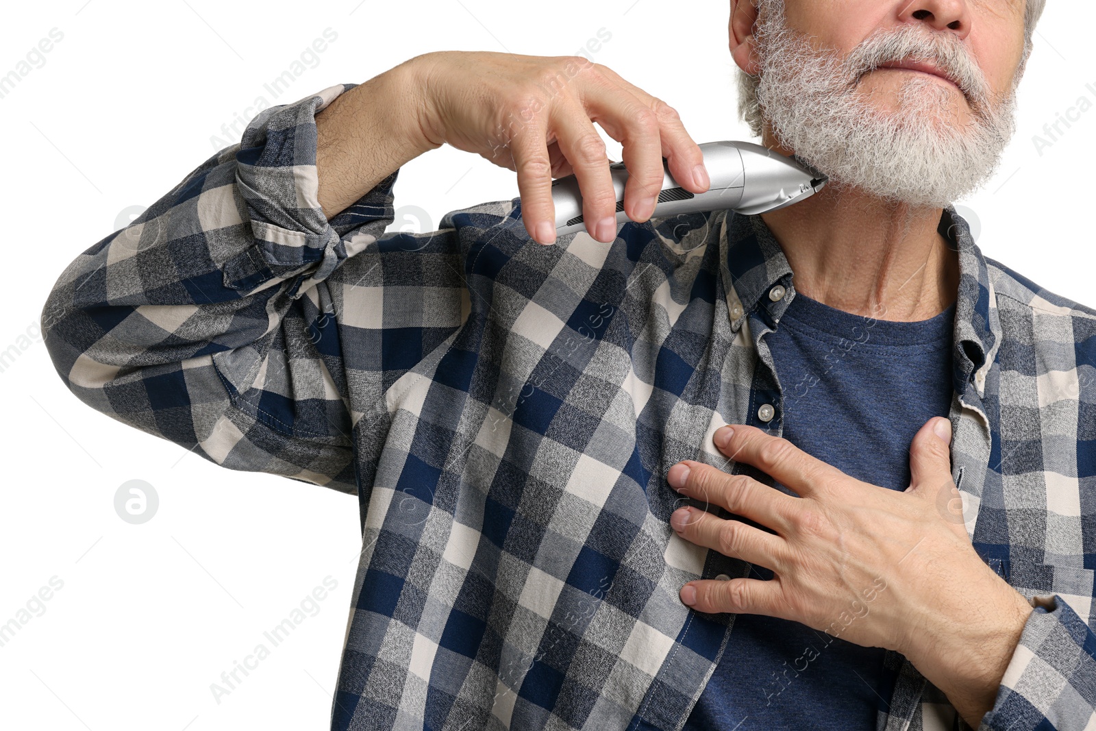 Photo of Man trimming beard on white background, closeup