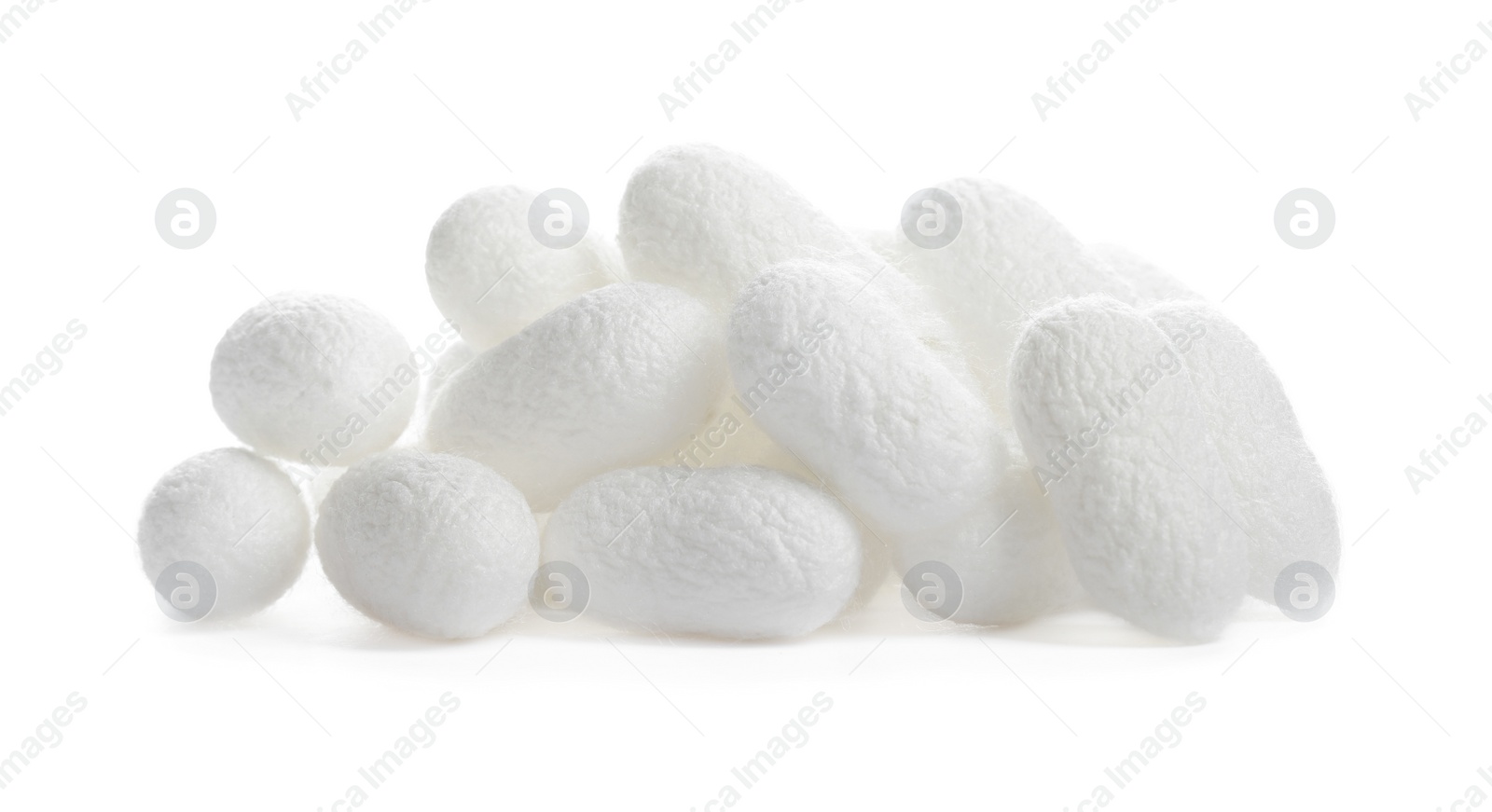 Photo of Pile of natural silkworm cocoons on white background