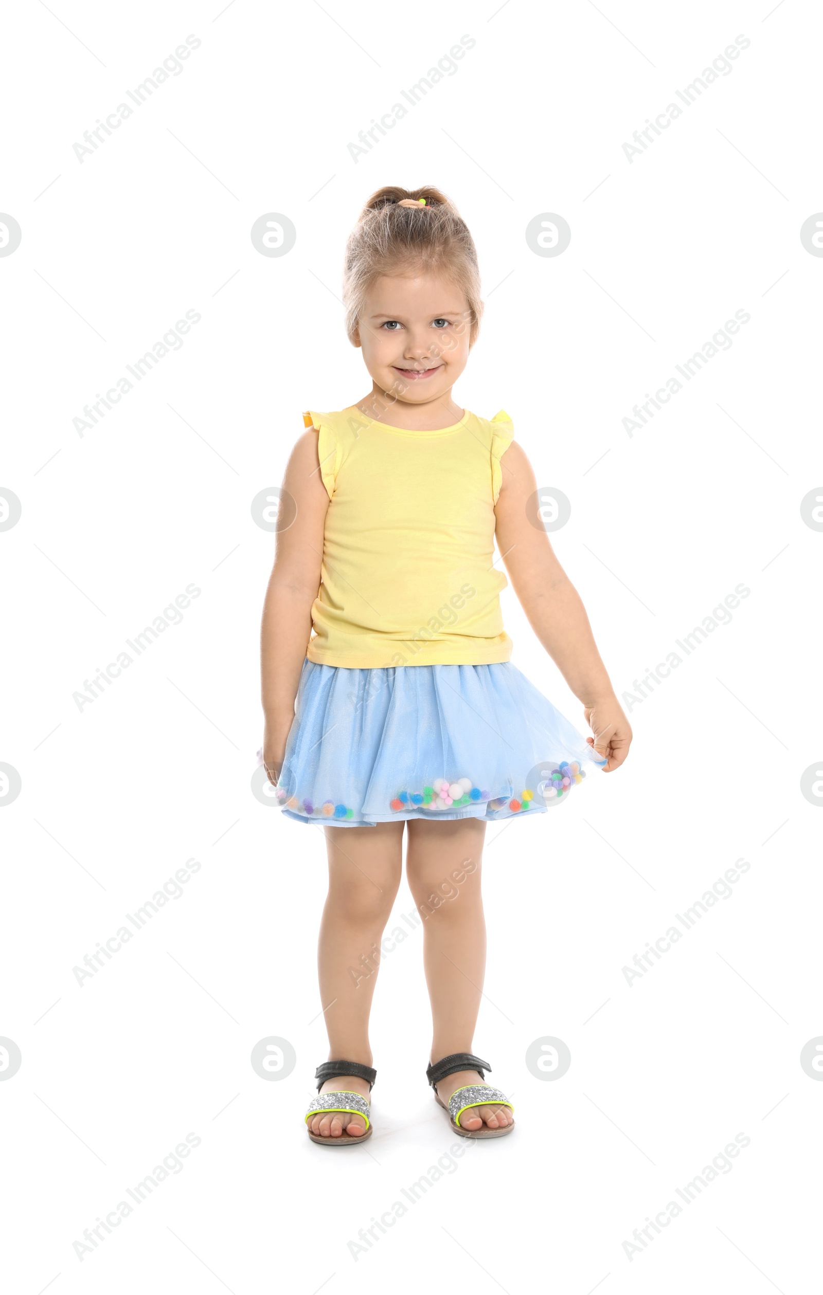 Photo of Full length portrait of cute little girl against white background