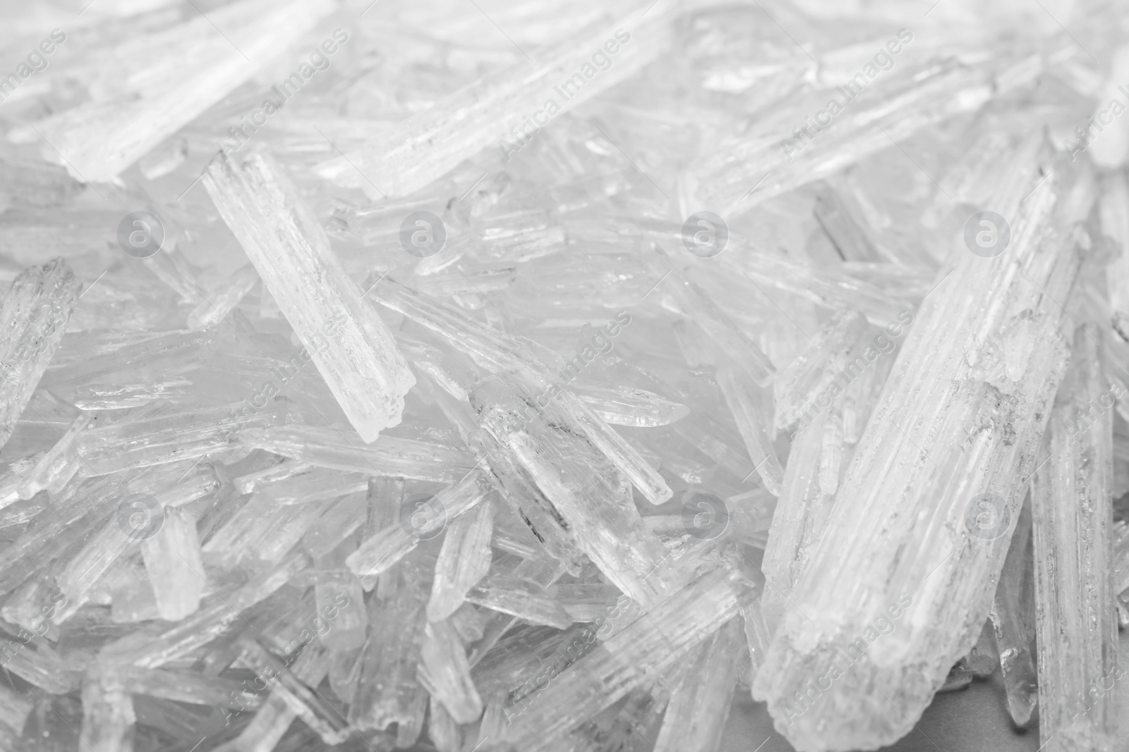 Photo of Heap of menthol crystals as background, top view
