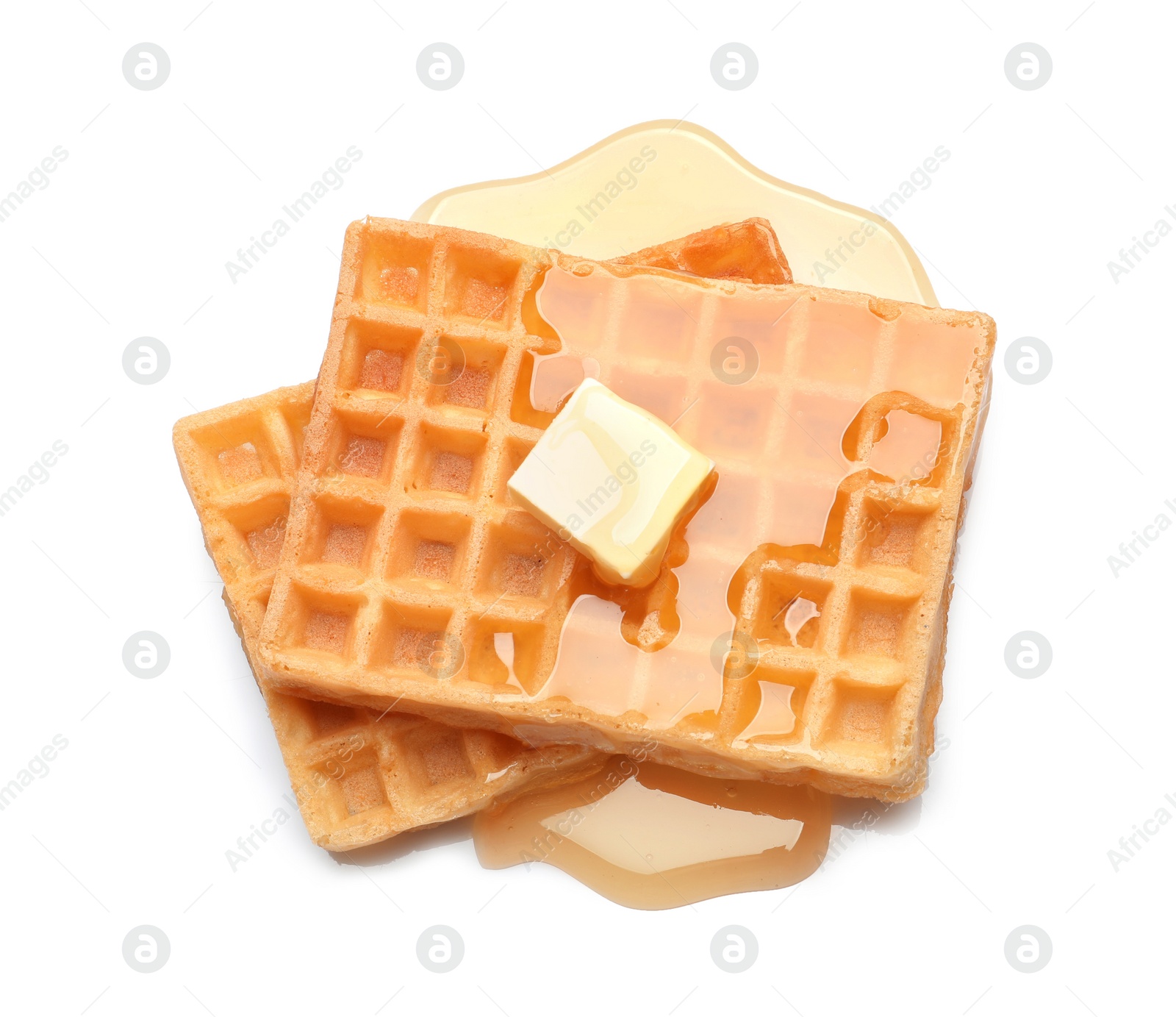 Photo of Delicious waffles with butter and honey on white background, top view