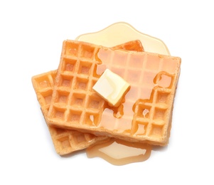 Photo of Delicious waffles with butter and honey on white background, top view