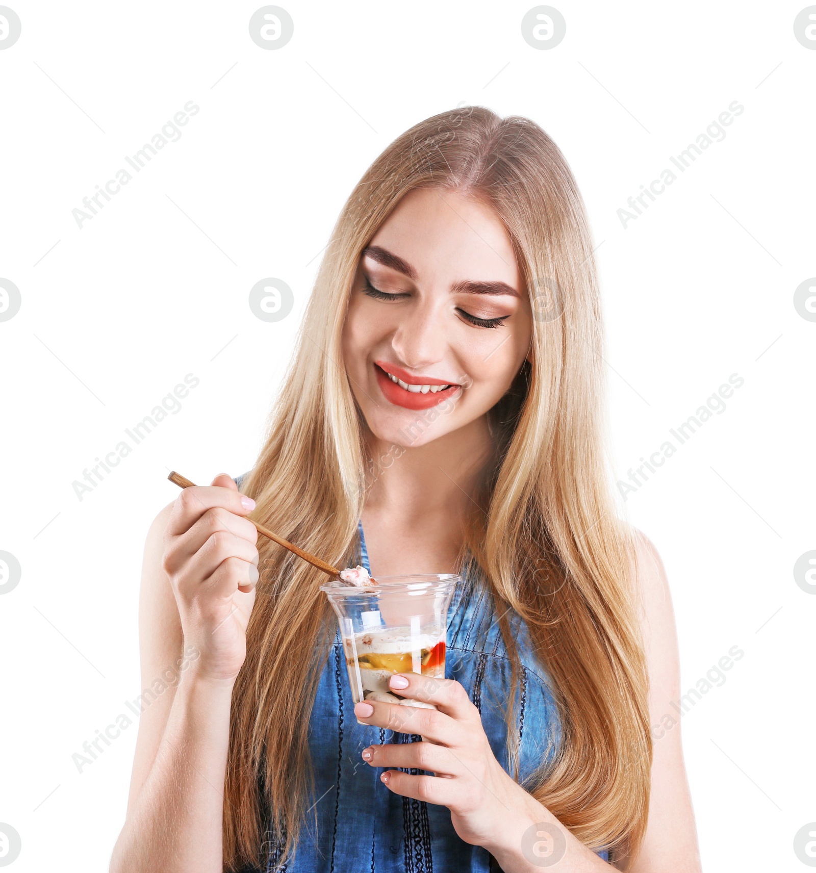 Photo of Young woman with yogurt on white background