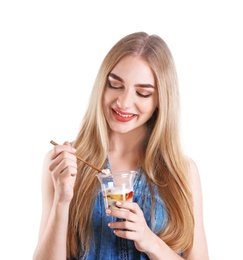 Photo of Young woman with yogurt on white background