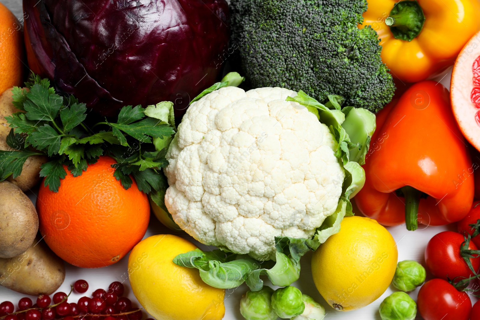 Photo of Fresh products rich in vitamin C, closeup