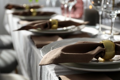 Festive table setting with beautiful decor indoors, closeup. Space for text