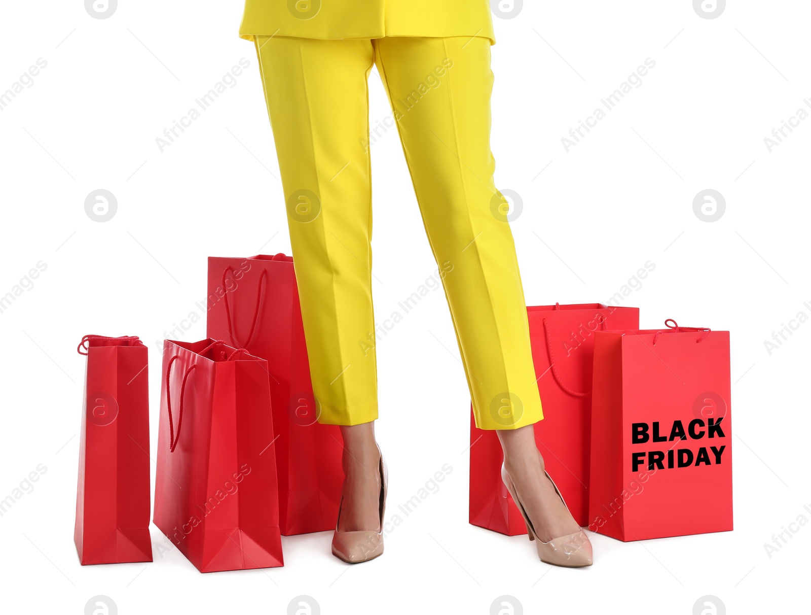 Photo of Woman and shopping bags on white background, closeup. Black Friday Sale
