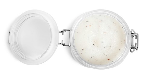 Photo of Open jar of exfoliating salt scrub isolated on white, top view