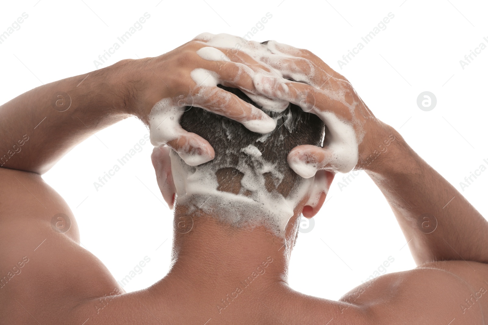 Photo of Man washing hair on white background, back view